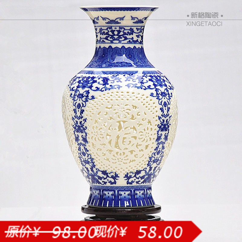 秒杀特价景德镇陶瓷器 薄胎镂空青花花瓶 现代时尚工艺品摆件设 秒杀特价景德镇陶瓷器 薄胎镂空青花花瓶 现代时尚工艺品摆件设