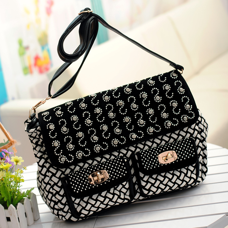 新款休闲包编织转锁l...