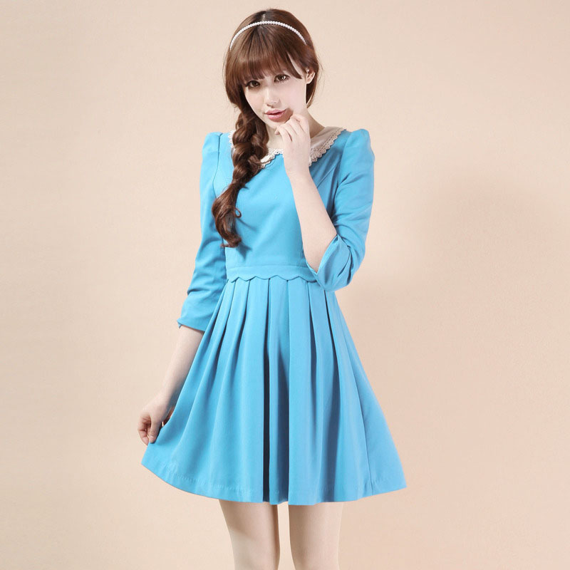 圆领收腰孔雀蓝花...