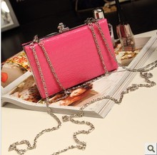 Korean version of the 2013 new retro candy colored chain bag clutch cosmetic bag mobile phone bag purse packet Female bag