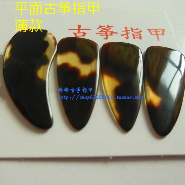 古筝指甲天然初学古筝假指甲 4片装薄款平面古筝义甲送古筝胶布在类目 乐器/吉他/钢琴/配件, 乐器配件, 乐器指甲中 - 来自Buy2taobao.com提供专业的淘宝代购服务