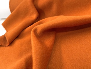 顺毛羊绒橘色斜纹光泽羊绒羊毛呢面料大衣外套西装汉服布料