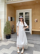 白色泡泡袖连衣裙女夏季法式气质蕾丝拼接镂空宽松显瘦长裙子