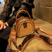 香港品牌包包女士2024流行质感单肩小包复古手提斜跨小圆包潮