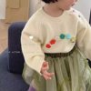 韩国童装2023秋季韩版杏色圆领套头针织开衫软糯毛衣外套洋气
