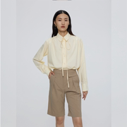 mest2022春夏浅黄色长袖系带衬衫，纯色通勤单排扣棉质女上衣