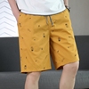 夏天薄款纯棉黄色，印花短裤男生潮牌时尚百搭直筒，宽松休闲半截中裤
