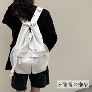 韩国小众设计慵懒风复古抽绳休闲帆布双肩包潮流中大学生书包男女