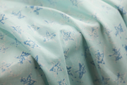 日本进口薄款浅绿蓝色，绘画星星印花纯棉细腻棉纱布料设计师面料