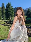 新疆草原旅游拍照度假长裙女超仙白色蕾丝性感透视气质吊带连衣裙