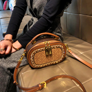香港品牌包包2024女真皮手提高级感小包包流行单肩斜跨小圆包
