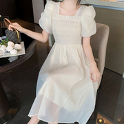 夏季2024设计感白色仙女气质连衣裙a字法式收腰小众设计长裙