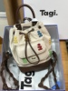 tagi画家双肩包mini时尚，水桶包手工(包手工，)珍珠编织肩带旅行束口包