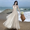 海边度假沙滩裙超仙女v领露背在逃公主白色挂脖吊带裙连衣裙夏季