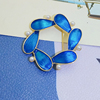 青岛饰品时尚简约湖蓝色花瓣圆形个性小众气质珍珠别针西装衬衫