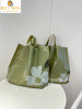 山茶花塑料袋手提袋男女，服装店袋子购物袋包装袋子，胶袋定制logo