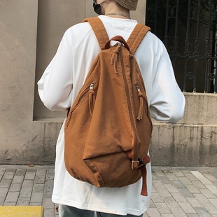 双肩包男水洗帆布小众电脑背包纯色复古高级感大容量学生书包男