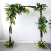 热带风情海边沙滩婚礼布置花艺拱门壁挂花束植物婚纱摄影道具