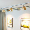 日式实木轨道灯家用原木色客厅背景墙创意个性LED明装导轨灯射灯