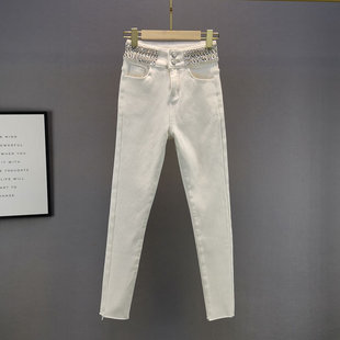 白色加绒加厚牛仔裤女潮冬季高腰，修身显瘦欧洲站水钻小脚长裤