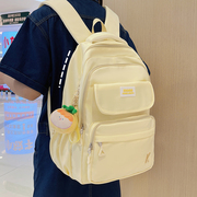 奶黄色书包女初中学生小学生，三到六年级大容量背包，韩版可爱双肩包