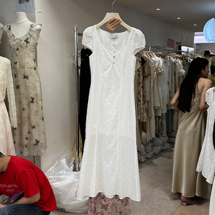 十三行女装2024夏款韩版独特镂空小花连衣裙设计感收腰白色长裙女