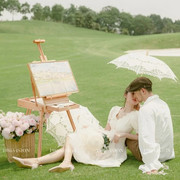 新婚纱摄影田园风格旅拍小清新蕾丝伞装花背篓样片道具画架网球拍