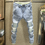 牛仔裤男夏季薄款高端潮牌修身小脚裤，个性斜扣袋时尚磨白休闲裤子