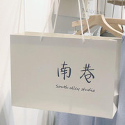 男女服装店袋子logo纸袋手提袋定制童装购物袋定制手提袋加厚