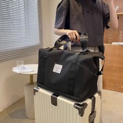 超火短途短期女士旅行包2023年行李袋，大容量手提包男款旅游包