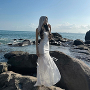kliou海边度假风气质，纯色抹胸连衣裙女设计感蝴蝶结，显瘦包臀长裙