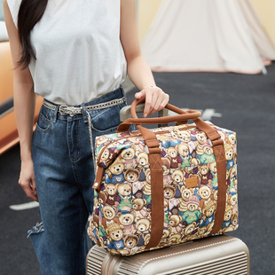 小熊可爱旅行袋原创手提大容量，帆布手提套拉杆功能女包潮旅行李包