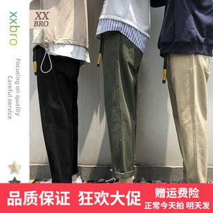 军绿色牛仔裤男潮牌学生，韩版春秋休闲潮流织带，宽松小直筒裤子