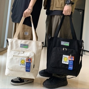 斜挎包男日系，简约帆布包潮牌大容量休闲手提包，学生上课韩版单肩包