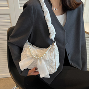 流行洋气设计珍珠手提包包女2024秋季斜挎包蝴蝶结单肩腋下包