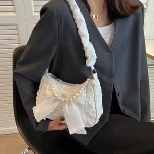 流行洋气设计珍珠手提包包女2024秋季斜挎包，蝴蝶结单肩腋下包
