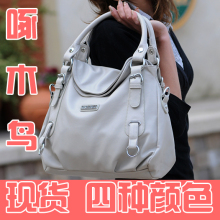 热卖韩版女包2010新款单肩斜挎包包包真皮牛皮啄木鸟1690防盗窃