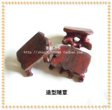 小紫檀根硬木底座.小木座2--3厘米不等.椭圆.不是正圆有大有小