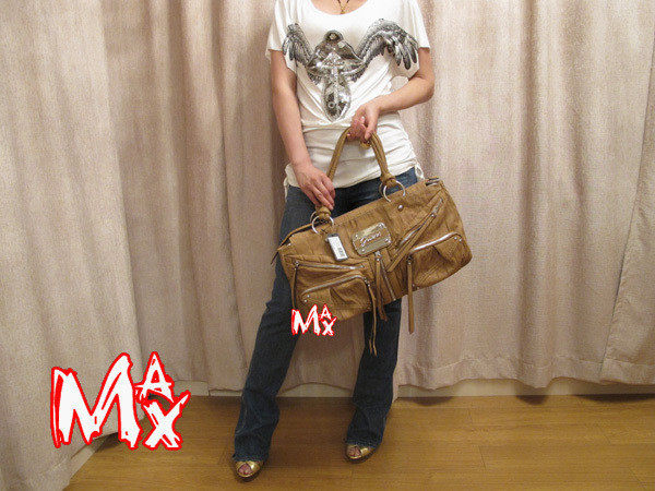 GUESS 2010春夏海报款式同系列,复古流苏大肩包(超级折扣促销)