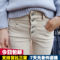 上下架计划:秋冬装韩版排扣黑白色高腰牛仔裤女小脚显瘦紧身铅笔裤女式长裤子