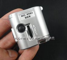 2010新款高档袖珍型60倍【显微镜】带LED灯带验钞多功能放