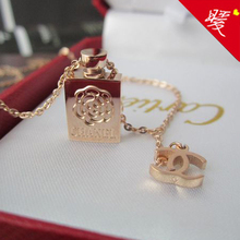 Poco caliente caliente Chennai * frasco de perfume Chanel con la flor de oro rosa de 18 quilates de oro Cartier collar