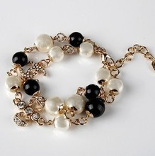 Europeos y americanos estilo Chanel Día de San Valentín arco diamante perla pulsera pulsera metálica CHANEL