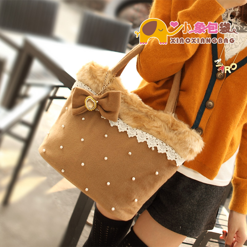 甜美珍珠蝴蝶结女包...