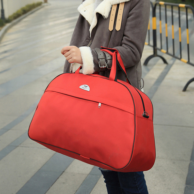 特价红色牛津布旅游包手提旅行包斜跨大包防水