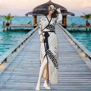 海边度假沙滩裙显瘦裹身裙波西米亚，海滩长裙v领长袖连衣裙女秋装